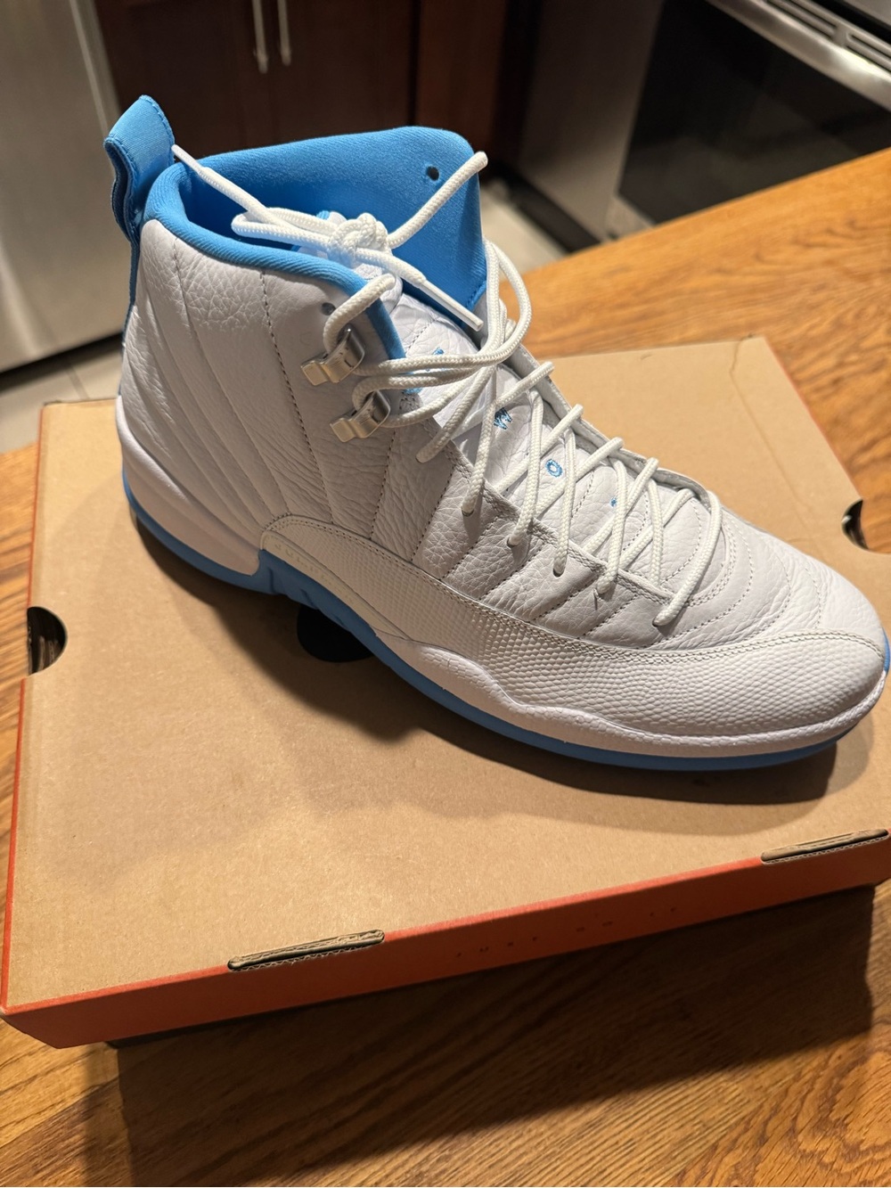 Jordan Men’s White and Light Blue High-Top Sneakers